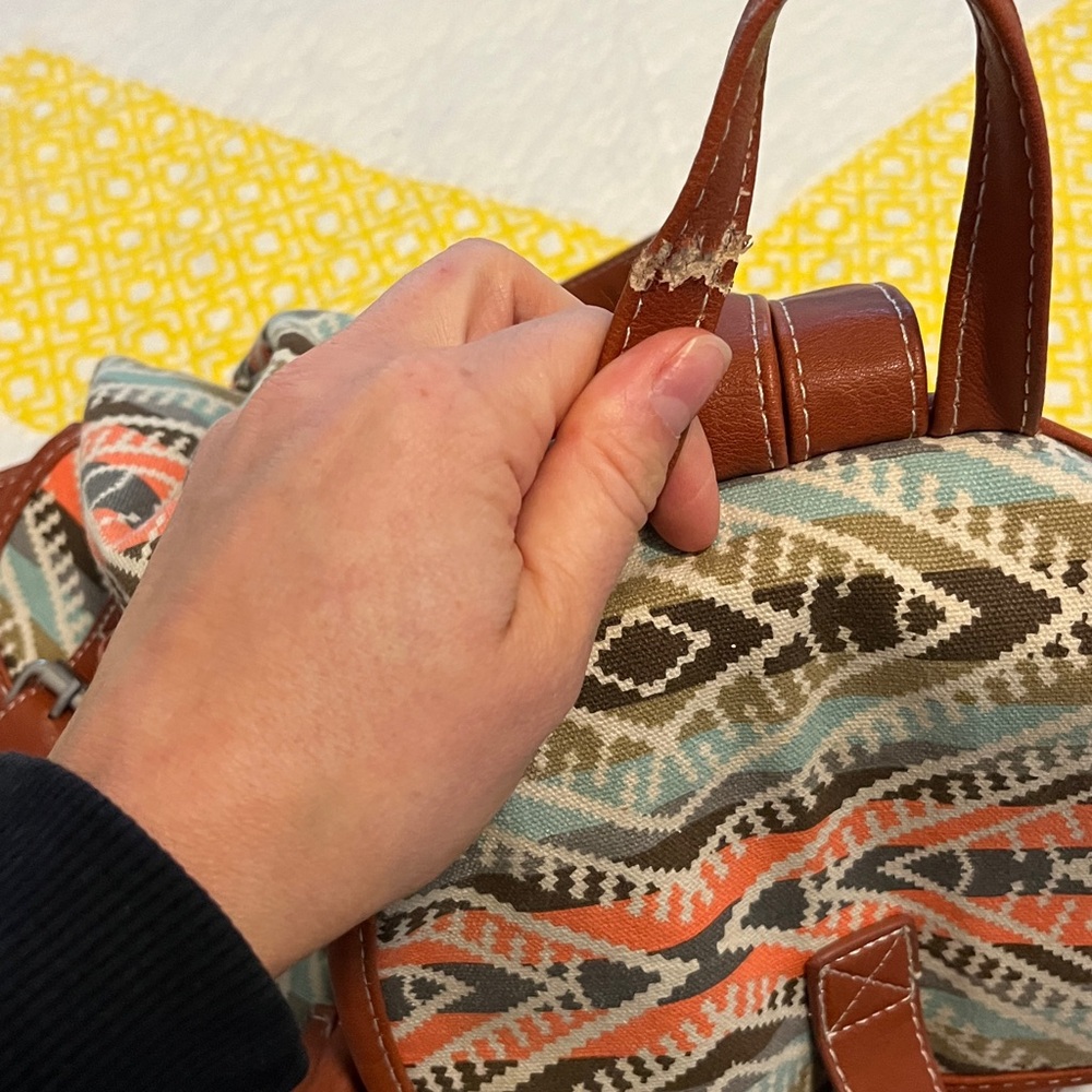 Patterned Backpack With Brown Accents - image 7